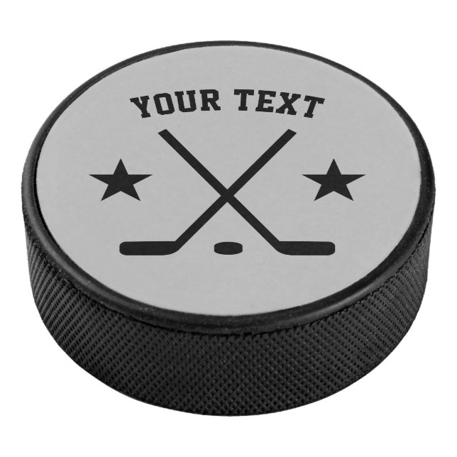 Custom ice hockey puck with crossed sticks logo (3/4)