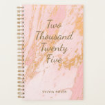 Custom Modern Blush Gold Marble Girly Name 2025 Planner<br><div class="desc">Stay chic and organised with this custom modern 2025 planner, featuring a stunning blush and gold marble design. The soft blush tones paired with luxe gold accents create a stylish, feminine look that's perfect for keeping your schedule on point. Personalise it with your name for an extra special touch, making...</div>