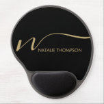 Custom Monogram Personalised With Name Black Gold Gel Mouse Pad<br><div class="desc">Upgrade your office setup with our Custom Monogram Personalised With Name Cool Black Gel Mouse Pad. This personalised mouse pad with wrist rest not only adds a touch of style to your workspace but also provides ergonomic support for comfortable daily use. It's an ideal gift for your boss, coworker, or...</div>