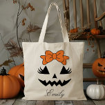 Custom Name Jack O Lantern Pumpkin Trick Or Treat Tote Bag<br><div class="desc">Celebrate Halloween in style with our Custom Name Jack O’ Lantern Pumpkin Trick Or Treat Tote Bag! This delightful tote features a cheerful jack-o’-lantern pumpkin design that’s perfect for adding a bit of spooky charm to your child’s Halloween festivities. Personalise it with your child’s name to make it uniquely theirs...</div>