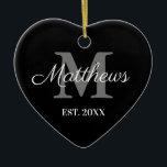 Custom name monogram black and white Christmas Ceramic Ornament<br><div class="desc">Custom family name monogram black and white Christmas Ceramic Ornament. Monogrammed heart shape ornament. Romantic design for him or her, couple, boyfriend, girlfriend, couple, husband and wife, newly weds, co worker, parents, grandparents etc. Add your own personalised initials and date. Great for 1st Christmas together and other romantic moments. Upload...</div>
