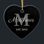 Custom name monogram black and white Christmas Ceramic Ornament<br><div class="desc">Custom family name monogram black and white Christmas Ceramic Ornament. Monogrammed heart shape ornament. Romantic design for him or her, couple, boyfriend, girlfriend, couple, husband and wife, newly weds, co worker, parents, grandparents etc. Add your own personalised initials and date. Great for 1st Christmas together and other romantic moments. Upload...</div>