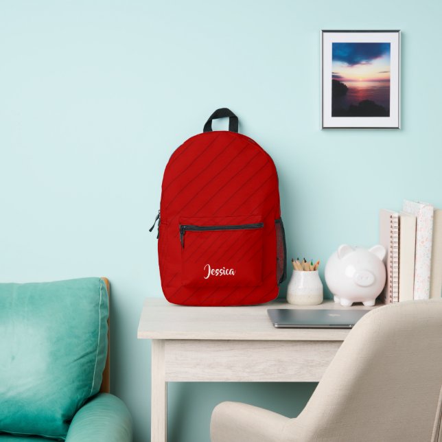 Custom name red diagonal plastic textured printed backpack (Insitu)