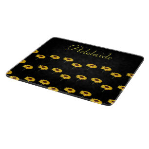 Custom name yellow sunflowers on black cutting board
