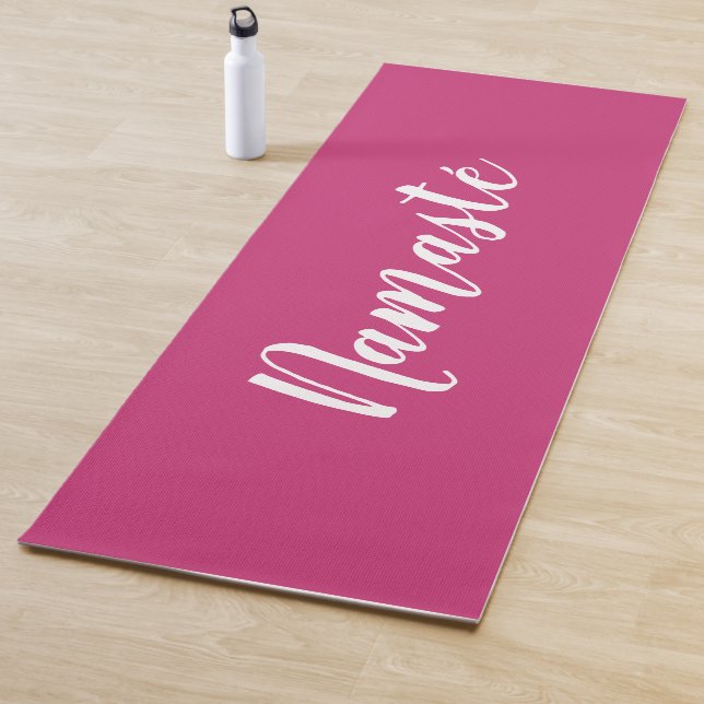 Custom pink Namasté yoga mat for class lessons (In Situ)