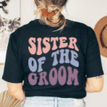 Custom Retro Sister of the Groom Wedding Party T-Shirt<br><div class="desc">Inject a dash of fun into your wedding party with our exclusive Retro Groovy Back Print Collection. Designed for people with a whimsical and non-traditional fashion sense, our collection boasts a wide array of matching retro outfits. Ideal for the bride, bridesmaid, and even the mother of the bride. These groovy...</div>