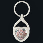 Custom Rose Gold Floral Monogram Heart Keychain<br><div class="desc">Carry elegance everywhere with this luxurious heart-shaped metal keychain. Featuring a stunning arrangement of blush pink roses and shimmering gold leaf accents. Perfectly customizable with your name or initial. A chic and durable gift for weddings,  new homes,  or a special treat for her.</div>