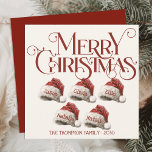 Custom Santa Hat Family Of 5 Red Merry Christmas Holiday Card<br><div class="desc">The Custom Santa Hat Family Of 5 Red Merry Christmas Holiday Card is a charming and festive way to send personalised holiday greetings from your family. Featuring adorable Santa hats for a family of five, this card exudes holiday spirit without needing a photo. The bold red backdrop combined with a...</div>