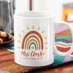 Custom Teacher Name Grade Boho Rainbow Sun Coffee Mug<br><div class="desc">Custom Teacher Name Grade Boho Rainbow Sun mug is a unique and stylish accessory that combines bohemian and earthy elements with a vibrant rainbow sun. In addition to the striking graphic, the button can also be customised with your teacher name, as well as the grade or any other quote, wether...</div>
