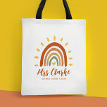 Custom Teacher Name Grade Boho Rainbow Sun Tote Bag<br><div class="desc">The Custom Name Boho Earth Tone Rainbow Sun tote bag is a unique and stylish accessory that combines bohemian and earthy elements with a vibrant rainbow sun. In addition to the striking graphic, the tote can also be customised with your teacher name, as well as the grade or any other...</div>