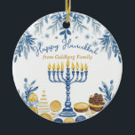Custom text Hanukkah Harmony Keepsake Ceramic Ornament<br><div class="desc">This charming Hanukkah ceramic circle ornament, named “Hanukkah Harmony Keepsake, ” is a delightful addition to any holiday decor. The front features an elegant menorah with glowing candles, surrounded by intricate blue and gold patterns of leaves and coins, evoking the festive spirit of Hanukkah. The graceful script “Happy Hanukkah” at...</div>