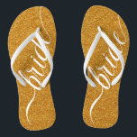 Custom Wedding Bride Flip Flops Gold Sparkle<br><div class="desc">Elegant white "bride" over a sparkly gold background. You can also delete the image and add your own background colour. Click "Customise It" and use the swatches on the right to change the background colour. The eyedropper tool gives you even more swatches, and "advanced" link opens the entire spectrum. You...</div>