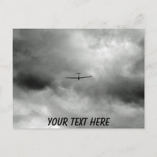 Customisable glider flying in grey sky postcard