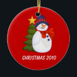 Customisable Snowman and Christmas Tree Ceramic Ornament<br><div class="desc">Snowman and Christmas Tree Ornament on a red background.</div>