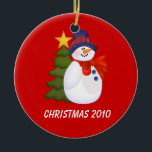 Customisable Snowman and Christmas Tree Ceramic Ornament<br><div class="desc">Snowman and Christmas Tree Ornament on a red background.</div>