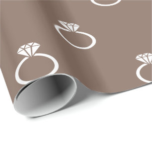 Customisable White Engagement Rings on Taupe Brown Wrapping Paper