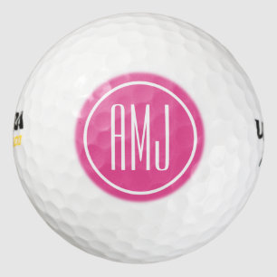 Customise pink and white monogram golf balls