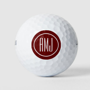 Customize red and white monogram golf balls