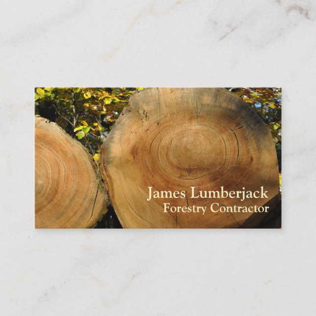 Cut logs in autumn business card (Front)