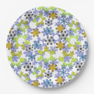 Cut paper snowflakes multicolored on white plate