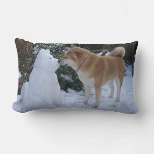 cute akita dog kissing snowman at christmas lumbar cushion