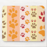 Cute Animal Paw Prints Pattern in Natural Colours Mouse Pad<br><div class="desc">A cute design with several rows of animal paw prints in natural colours like brown,  yellow,  red and orange on a striped pattern. Some paws have claws and others do not.</div>