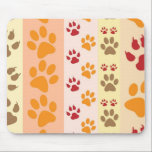 Cute Animal Paw Prints Pattern in Natural Colours Mouse Pad<br><div class="desc">A cute design with several rows of animal paw prints in natural colours like brown,  yellow,  red and orange on a striped pattern. Some paws have claws and others do not.</div>