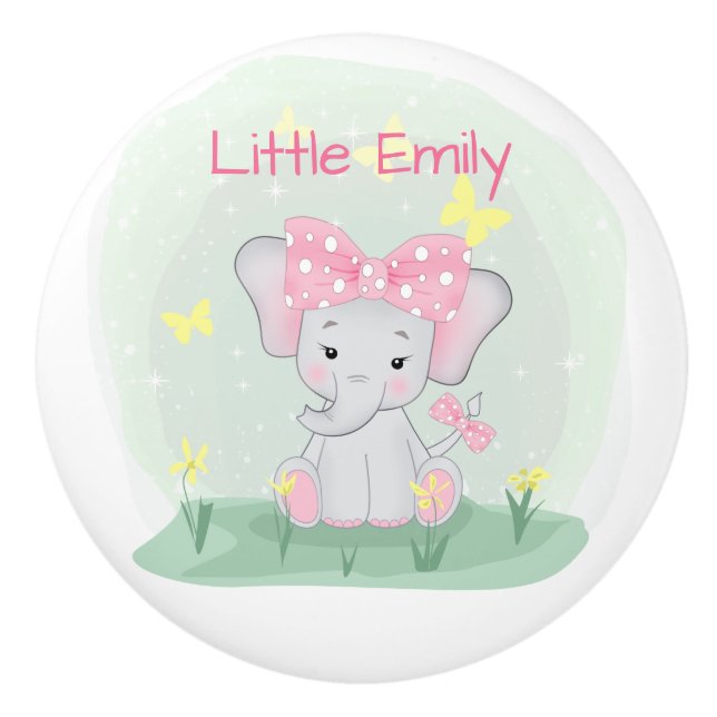  Cute baby elephant with a pink bow in a clearing  Ceramic Knob (Front)