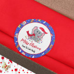 Cute Baby Elephant With Zoo Merry Christmas  Classic Round Sticker<br><div class="desc">This charming design features a cute baby elephant adorned with Christmas lights, set against a backdrop of playful holiday elements. The design includes a variety of beloved animals in festive attire, accented with snowflakes and star trim. Personalise it with your family name for a special touch that adds warmth and...</div>