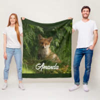 Cute Baby Fox in a Green Forest