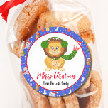 Cute Baby Lion With Zoo Merry Christmas  Classic Round Sticker<br><div class="desc">This charming design features a cute baby lion holding candy canes. The design includes a variety of beloved animals in festive attire,  accented with snowflakes and star trim. Personalise it with your family name for a special touch that adds warmth and joy to the holiday season.</div>