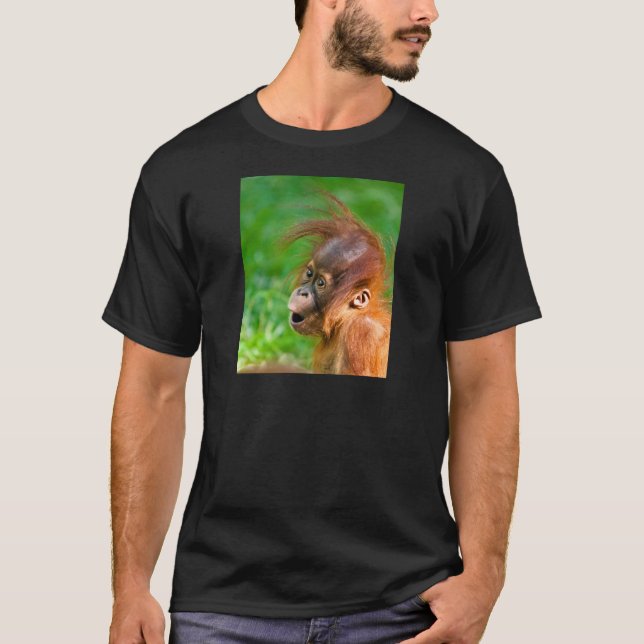 Cute baby orangutan looks on in wonder T-Shirt (Front)