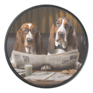 Cute basset hounds reading newspaper hockey puck