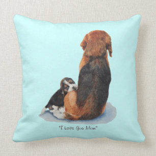 cute beagle puppy cuddling mum dog cushion