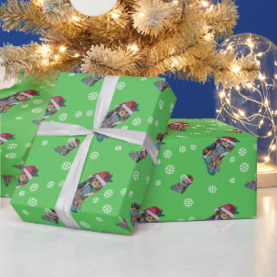 cute black and brown puppy dressed for christmas wrapping paper
