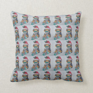 cute black and brown puppy with christmas stocking cushion