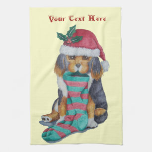 cute black and brown puppy with christmas stocking tea towel
