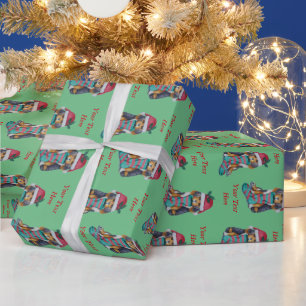 cute black and brown puppy with christmas stocking wrapping paper