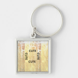 CUTE_ BLACK AND LIGHT YELLOW  KEYCHAIN