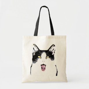 Cute black and white cat laughing tote bag