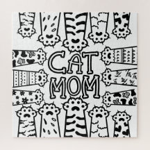 Cute Black and white cat mum with cat paws