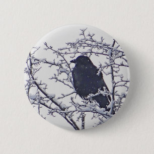 Cute black bird in snowy branches 6 cm round badge