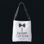 Cute Black Bow Tie & Buttons Groom's Wedding Crossbody Bag<br><div class="desc">These fun bags are designed especially for the groom. They feature an image of a black tie with three buttons and text that reads Groom with a space to enter his name as well as the wedding couple's names and wedding date. Great way to show your thanks for all of...</div>