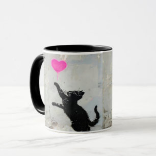 Cute Black Cat Playing with A Pink Heart Mug
