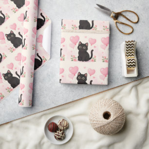 Cute black cat with pink hearts and flowers wrapping paper