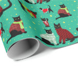 Cute Black Cats in Christmas Sweaters  Wrapping Paper<br><div class="desc">Cute black cats show off their fancy Christmas sweaters on bright green background sprinkled with stars. This is a fun wrapping paper for cat lovers and Christmas sweater lovers alike.</div>