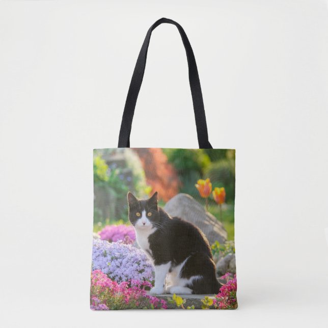 Cute Black White Cat in a Colourful Flowery Garden Tote Bag (Front)
