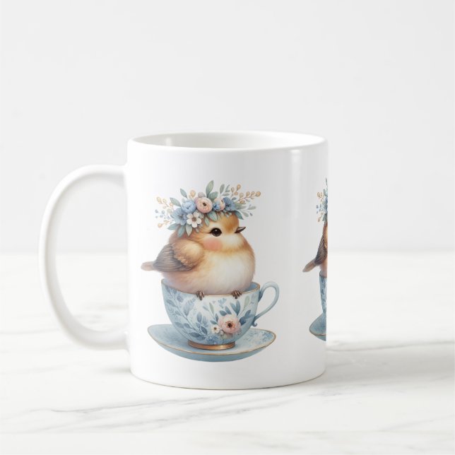 Cute Blue Bird with Floral Crown in Teacup Coffee Mug (Left)