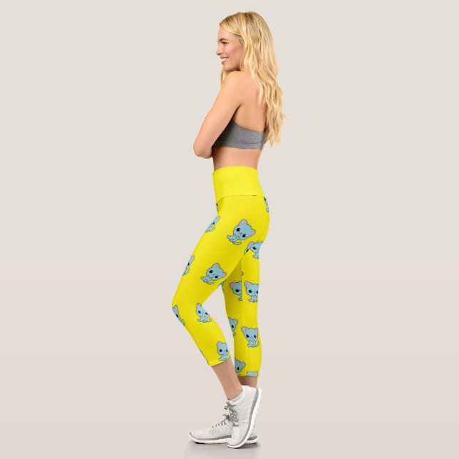 Cute bouncy blue kitten on yellow capri leggings (Left)