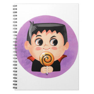 Cute boy in a vampire Halloween costume Notebook